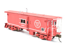 Load image into Gallery viewer, HO Brass OMI - Overland Models, Inc. WP - Western Pacific Bay Window Caboose Painted For Missouri Pacific