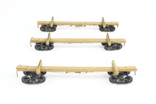 Load image into Gallery viewer, HO Brass NWSL - Northwest Short Line Various Roads 43' Skeleton Log Cars 3-Pack w/ Trucks