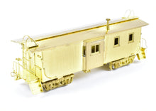 Load image into Gallery viewer, HO Brass OMI - Overland Models, Inc. CStP M&O C&NW Wood Bay-Window Caboose #6076 Omaha Rd