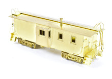 Load image into Gallery viewer, HO Brass OMI - Overland Models, Inc. CStP M&O C&NW Wood Bay-Window Caboose #6076 Omaha Rd