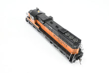 Load image into Gallery viewer, HO Rapido Trains, Inc. Milw - Milwaukee Road EMD SD10 FP #553 1974+ Era DC/Silent Version