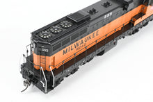 Load image into Gallery viewer, HO Rapido Trains, Inc. Milw - Milwaukee Road EMD SD10 FP #553 1974+ Era DC/Silent Version