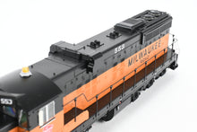 Load image into Gallery viewer, HO Rapido Trains, Inc. Milw - Milwaukee Road EMD SD10 FP #553 1974+ Era DC/Silent Version