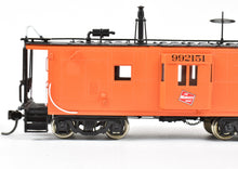 Load image into Gallery viewer, HO Brass OMI - Overland Models, Inc. MILW - Milwaukee Road (CMSTP&P) Riveted Bay Window Caboose Built by Thrall CP No. 992151