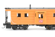 Load image into Gallery viewer, HO Brass OMI - Overland Models, Inc. MILW - Milwaukee Road Bay Window Caboose With Small Intermediate Ribs Factory Painted No. 992065