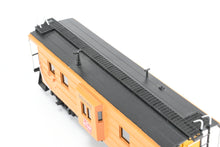 Load image into Gallery viewer, HO Brass OMI - Overland Models, Inc. MILW - Milwaukee Road Bay Window Caboose With Small Intermediate Ribs Factory Painted No. 992065