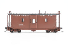Load image into Gallery viewer, HO Brass OMI - Overland Models, Inc. NP - Northern Pacific Wood Bay Window Caboose #10506-10594 Pro-Painted No. 1594