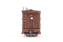 Load image into Gallery viewer, HO Brass OMI - Overland Models, Inc. NP - Northern Pacific Wood Bay Window Caboose #10506-10594 Pro-Painted No. 1594