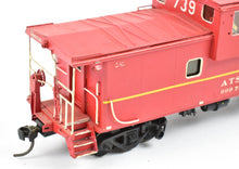 Load image into Gallery viewer, HO Brass OMI - Overland Models, Inc. AT&SF - Santa Fe Wide-Vision Ce-6 and Ce-8 Caboose CP No. 999730