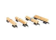Load image into Gallery viewer, HO Brass NWSL - Northwest Short Line Various Roads 50' Skeleton Log Cars 4-Pack with Trucks and loads CP