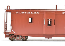 Load image into Gallery viewer, HO Brass CON OMI - Overland Models, Inc. NP - Northern Pacific Wood Bay Window Caboose FP No. 1532