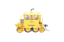 Load image into Gallery viewer, HO Brass CON OMI - Overland Models Inc. Various Roads 4150 Magnum "Trackmobile" Factory Painted Yellow, Lettered