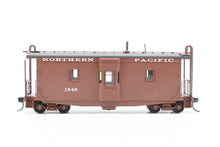 Load image into Gallery viewer, HO Brass OMI - Overland Models, Inc. NP - Northern Pacific Wood Bay Window Caboose #10506-10594 Pro-Painted No. 1546