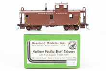 Load image into Gallery viewer, HO Brass CON OMI - Overland Models, Inc. NP - Northern Pacific Steel Caboose W/Tall Cupola CP No. 1002