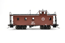 Load image into Gallery viewer, HO Brass OMI - Overland Models, Inc. MP - Missouri Pacific Wood-Side Caboose w/Angled Braces on Cupola Antenna on Roof F/P #866R