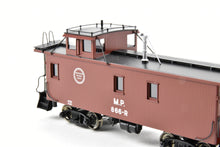 Load image into Gallery viewer, HO Brass OMI - Overland Models, Inc. MP - Missouri Pacific Wood-Side Caboose w/Angled Braces on Cupola Antenna on Roof F/P #866R