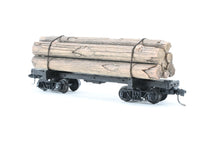 Load image into Gallery viewer, HOn3 Micro-Trains Various Roads 30’ Skeleton Log Car With Load