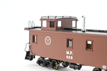 Load image into Gallery viewer, HO Brass OMI - Overland Models, Inc. MP - Missouri Pacific Wood-Side Caboose F/P #825