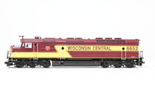 Load image into Gallery viewer, HO Brass OMI - Overland Models, Inc. WC - Wisconsin Central EMD FP45 FP Maroon/Yellow #6652 w/Lights