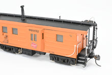 Load image into Gallery viewer, HO Brass OMI - Overland Models, Inc. MILW - Milwaukee Road Bay Window Caboose With Straight Trucks CP No. 991852