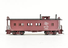 Load image into Gallery viewer, HO Brass CON OMI - Overland Models, Inc. MILW - Milwaukee Road 36' Wood Caboose FP No. 0558