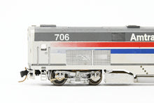 Load image into Gallery viewer, N Brass OMI - Overland Models, Inc. Amtrak GE B-32-8P-DM Dual Mode w/3rd Rail Shoe Castings Factory Painted Phase III No. 706
