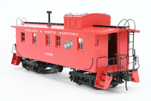 Load image into Gallery viewer, O Brass DVP - Division Point C&amp;NW - Chicago &amp; North Western Cupola Caboose w/o Windows Factory Painted No. 12388 ONE END DOOR LOOSE
