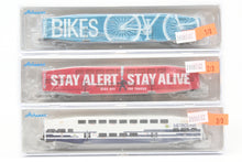 Load image into Gallery viewer, N Athearn Metrolink Bombardier Coach 3-Pack Special Edition "Bikes" and "Stay Alert Stay Alive" Cars - MISSING OUTER SLEEVE
