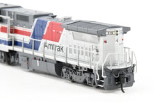 Load image into Gallery viewer, N Atlas Amtrak Dash8-32-BWH Phase III “Pepsi Can” No. 519
