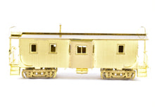 Load image into Gallery viewer, HO Brass OMI - Overland Models, Inc. CStP M&amp;O C&amp;NW Wood Bay-Window Caboose #6076 Omaha Rd
