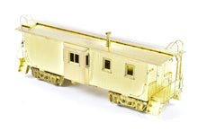 Load image into Gallery viewer, HO Brass OMI - Overland Models, Inc. CStP M&amp;O C&amp;NW Wood Bay-Window Caboose #6076 Omaha Rd
