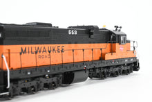 Load image into Gallery viewer, HO Rapido Trains, Inc. Milw - Milwaukee Road EMD SD10 FP #553 1974+ Era DC/Silent Version
