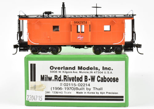 HO Brass OMI - Overland Models, Inc. MILW - Milwaukee Road (CMSTP&P) Riveted Bay Window Caboose Built by Thrall, CP No. 992151