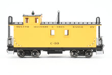 Load image into Gallery viewer, HO Brass Shoreham Shops DM&amp;IR - Duluth Missabe &amp; Iron Range Long Caboose w/ End Cupola Factory Painted No. C-99
