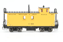 Load image into Gallery viewer, HO Brass Shoreham Shops DM&amp;IR - Duluth Missabe &amp; Iron Range Long Caboose w/ End Cupola Factory Painted No. C-99
