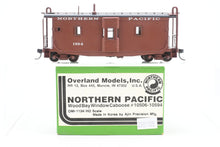 Load image into Gallery viewer, HO Brass OMI - Overland Models, Inc. NP - Northern Pacific Wood Bay Window Caboose #10506-10594 Pro-Painted No. 1594
