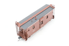 Load image into Gallery viewer, HO Brass OMI - Overland Models, Inc. NP - Northern Pacific Wood Bay Window Caboose #10506-10594 Pro-Painted No. 1594
