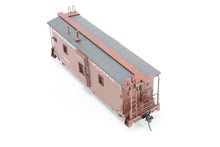 Load image into Gallery viewer, HO Brass OMI - Overland Models, Inc. NP - Northern Pacific Wood Bay Window Caboose #10506-10594 Pro-Painted No. 1594

