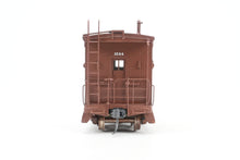 Load image into Gallery viewer, HO Brass OMI - Overland Models, Inc. NP - Northern Pacific Wood Bay Window Caboose #10506-10594 Pro-Painted No. 1594
