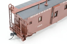 Load image into Gallery viewer, HO Brass OMI - Overland Models, Inc. NP - Northern Pacific Wood Bay Window Caboose #10506-10594 Pro-Painted No. 1594
