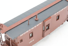 Load image into Gallery viewer, HO Brass OMI - Overland Models, Inc. NP - Northern Pacific Wood Bay Window Caboose #10506-10594 Pro-Painted No. 1594
