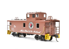 Load image into Gallery viewer, HO Brass CON OMI - Overland Models, Inc. NP - Northern Pacific Steel Caboose W/Tall Cupola CP No. 1004
