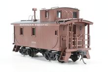 Load image into Gallery viewer, HO Brass NWSL - Northwest Short Line NP - Northern Pacific 1700 Series Wood Caboose 1940’s Rebuilt Custom Painted &amp; Weathered No. 1791
