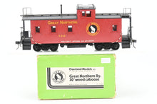 Load image into Gallery viewer, O Brass CON OMI - Overland Models, Inc. GN - Great Northern 30' Wood Sides Caboose Custom Painted No. X212
