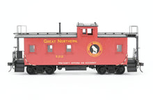 Load image into Gallery viewer, O Brass OMI - Overland Models, Inc. GN - Great Northern 30' Wood Sides Caboose Custom Painted No. X212
