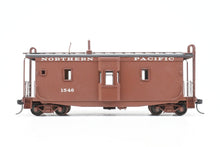 Load image into Gallery viewer, HO Brass OMI - Overland Models, Inc. NP - Northern Pacific Wood Bay Window Caboose #10506-10594 Pro-Painted No. 1546
