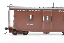 Load image into Gallery viewer, HO Brass OMI - Overland Models, Inc. NP - Northern Pacific Wood Bay Window Caboose #10506-10594 Pro-Painted No. 1546
