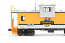 Load image into Gallery viewer, HO Brass OMI - Overland Models, Inc. D&amp;RGW - Denver &amp; Rio Grande Western Wide Vision Caboose 1500 Class FP No. 01500 2002 Run
