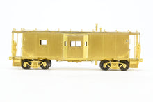 Load image into Gallery viewer, HO Brass OMI - Overland Models, Inc. C&amp;NW - Chicago &amp; North Western Steel Bay Window Caboose As Rebuilt 1970s
