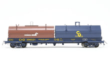 Load image into Gallery viewer, O Brass OMI - Overland Models, Inc. C&amp;O - Chesapeake &amp; Ohio Evans Steel Coil Steel Car w/full Walkways &amp; Angled Covers. With C&amp;O and Contrail Hoods Factory Painted No. 306521
